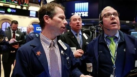 Wall St ends modestly higher ahead of earnings, economic data