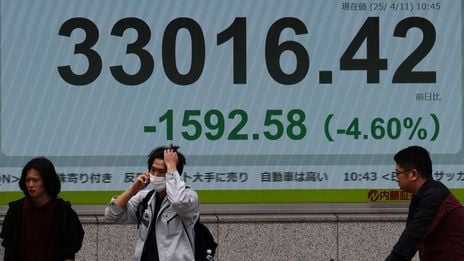 US bond yields rise, dollar down as turbulent week comes to an end
